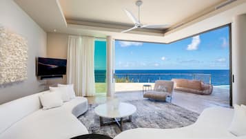 The Cliff Penthouse Suite | Living area | Flat-screen TV, toys