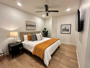 1 bedroom, desk, iron/ironing board, travel crib