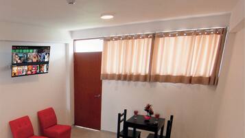 Basic Single Room, 1 Queen Bed, Private Bathroom | Desk, bed sheets