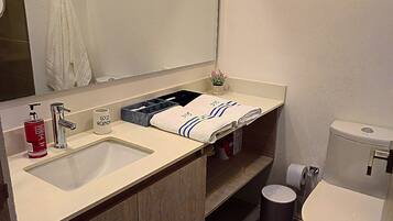 Hair dryer, towels, toilet paper