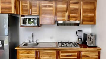 Fridge, microwave, stovetop, coffee/tea maker