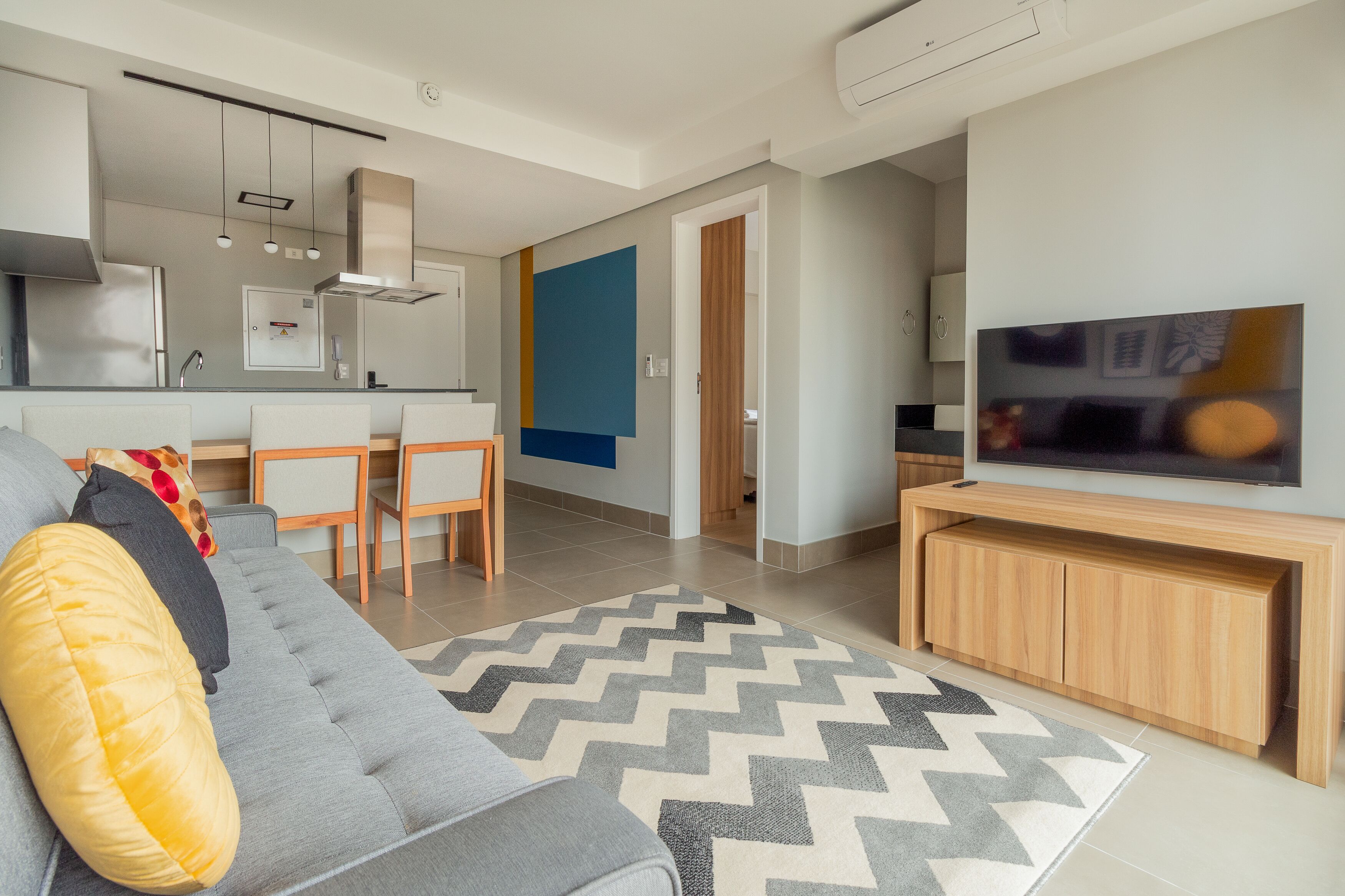 Apartamento, 1 cama Queen e sofá-cama, sacada, vista para a cidade | Área de estar