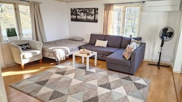 Villa | Living area | TV, fireplace