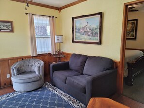 Cabin | Living area | 42-inch Smart TV with digital channels, fireplace - Hillcrest Suites & Cabins (Big Bear Lake)