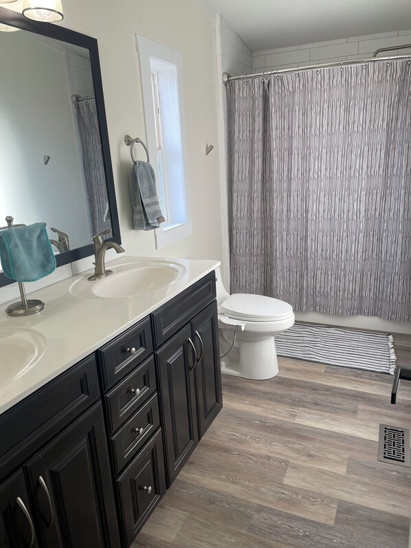 Bidet, towels, toilet paper