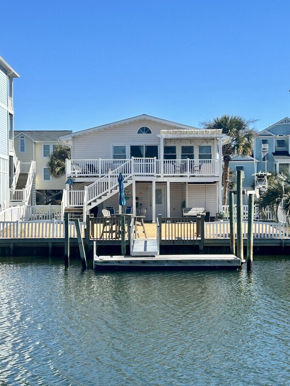 Exterior - Canal by the Sea: Renovated canal home with decks, boat access and fenced pet-friendly yard (Supply)
