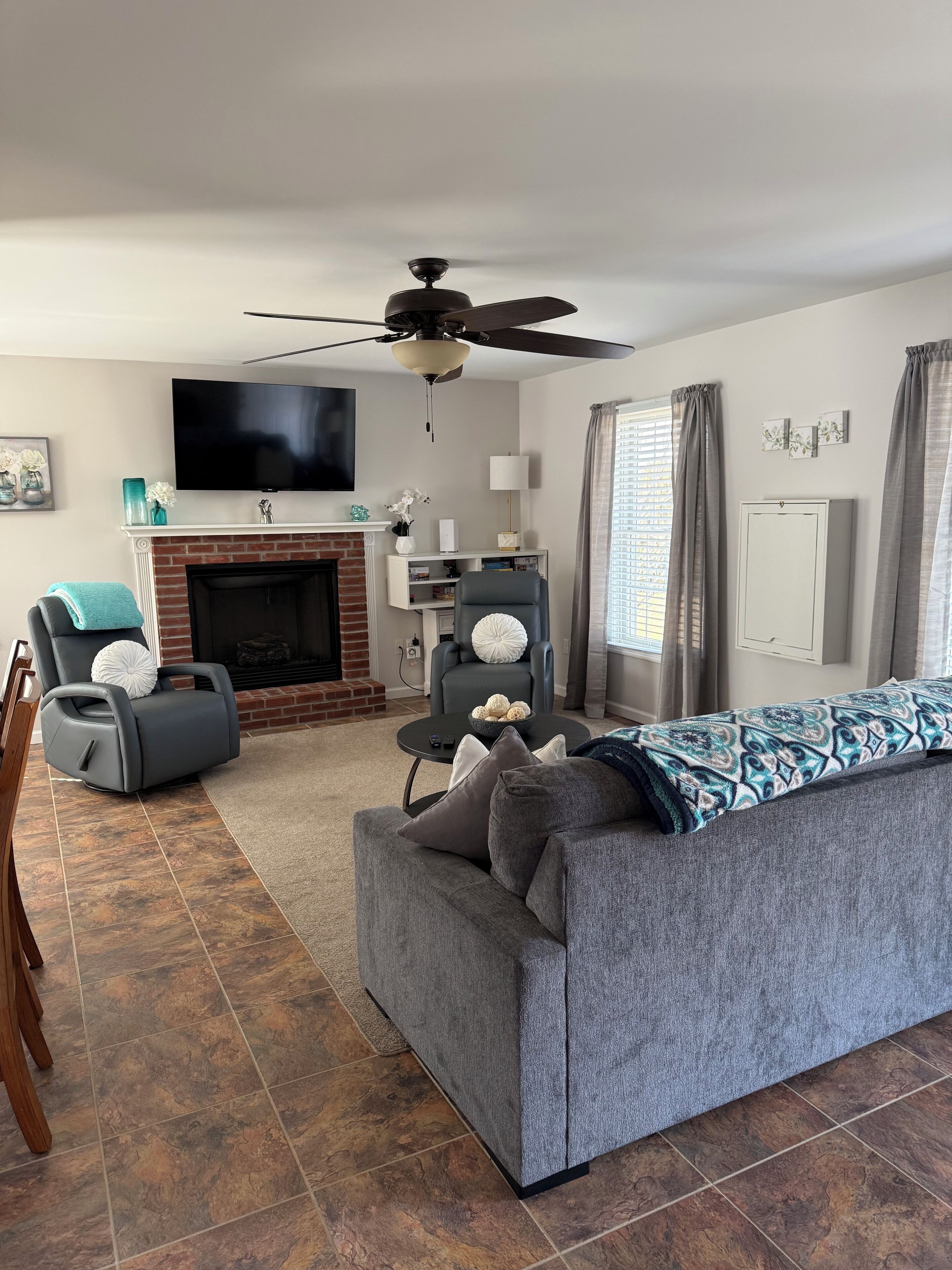 Smart TV, fireplace, books