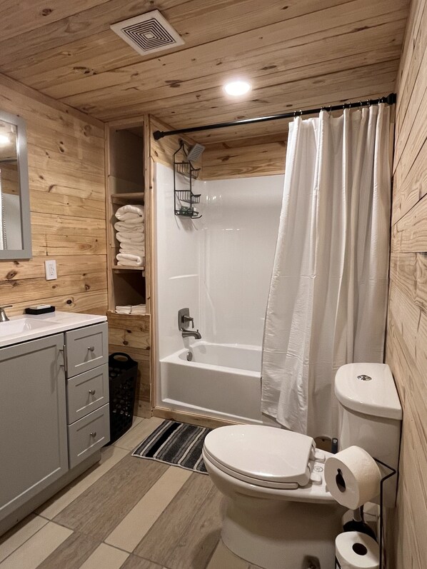 Shower, towels, soap, shampoo