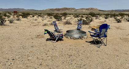 Campground with fire pit under the stars
