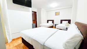 Family Triple Room | WiFi (free), bed sheets - Samaná Hostal (Tacna)