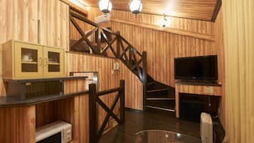 Double Room, 1 Double Bed | Living area | 43-inch LCD TV with cable channels, DVD player