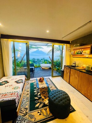 Deluxe Cabin, 1 Bedroom, Mountain View | Living area | Fireplace - Black Wood Cabin (Kintamani)