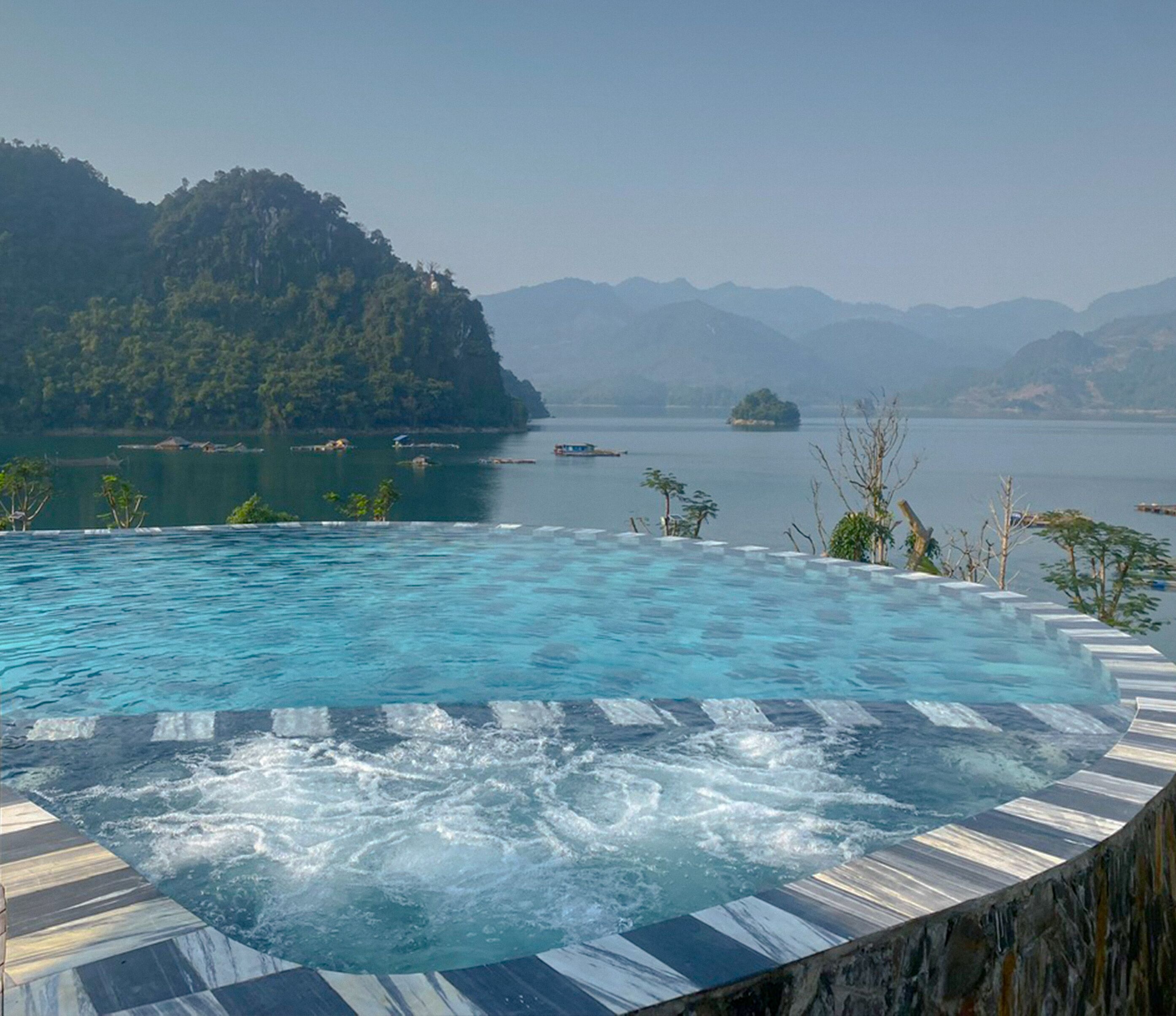 Outdoor pool, open 7:00 AM to 9:00 PM, pool umbrellas, pool loungers