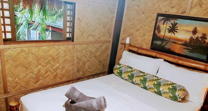 Private traditional kubo with mountain views on a peaceful Zambales farm