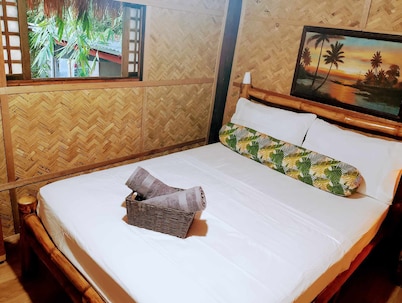 Private traditional kubo with mountain views on a peaceful Zambales farm