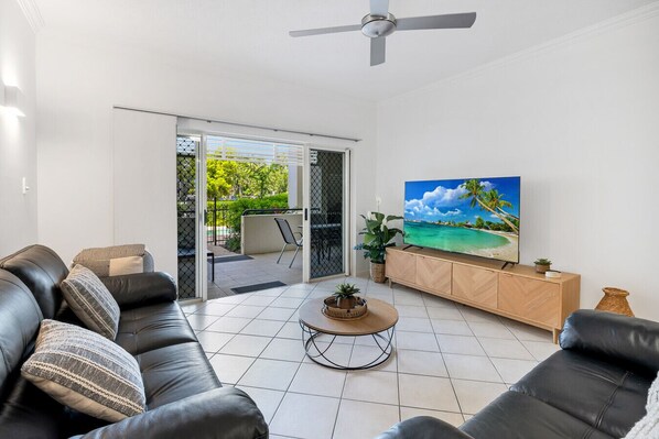 Light filled living room with direct access to a private garden terrace