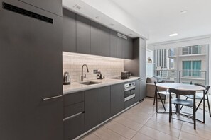 Fridge, microwave, oven, stovetop - Downtown Miami Yotel 1 Bedroom (Miami)