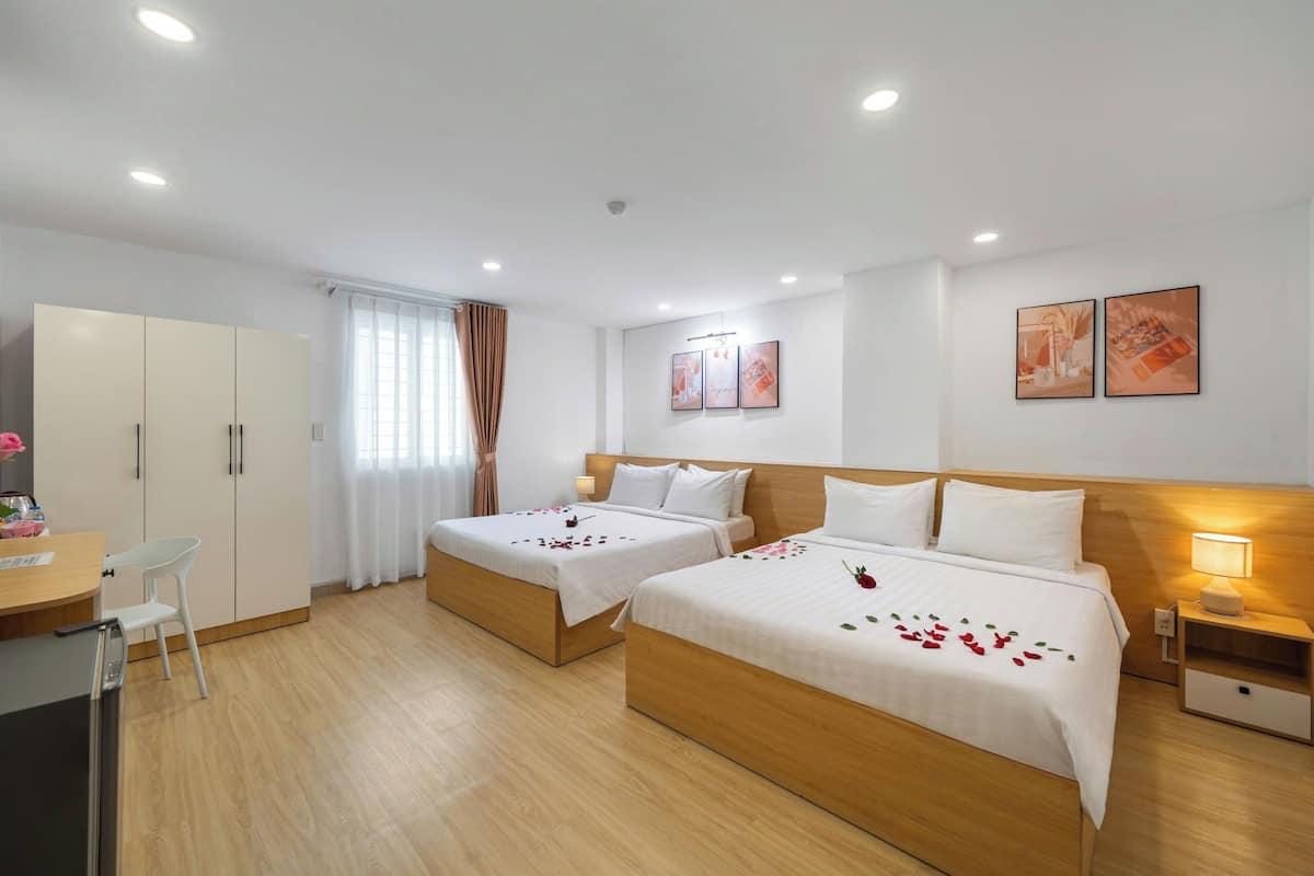 Family Quadruple Room | Minibar, free WiFi, bed sheets
