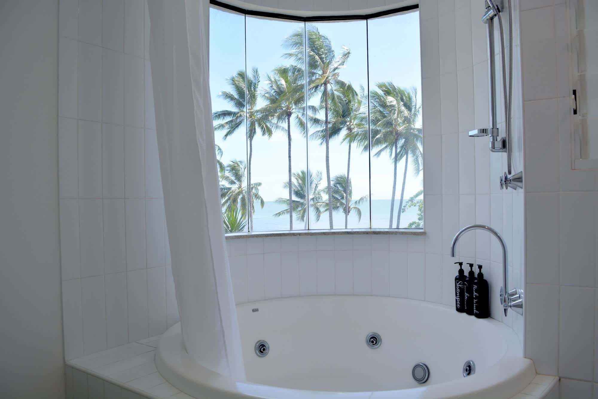 Shower, hair dryer, towels, shampoo