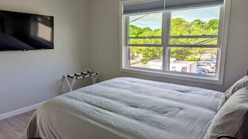1 bedroom, desk, iron/ironing board, travel cot