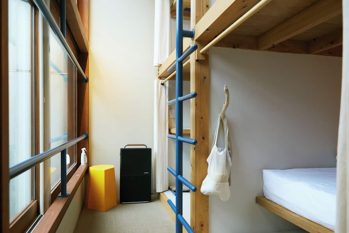 Family Quadruple Room, Shared Bathroom | In-room safe, desk, free WiFi, bed sheets