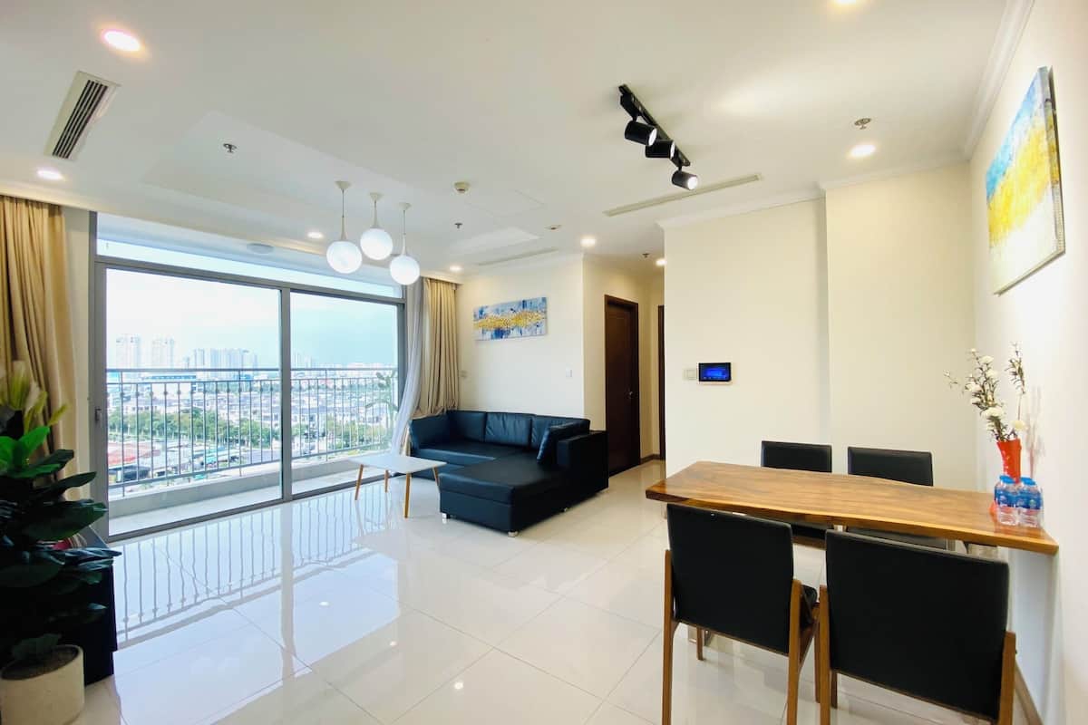 Panoramic Apartment, 2 Bedrooms, Refrigerator & Microwave, City View | Living area | 60-inch Smart TV with digital channels