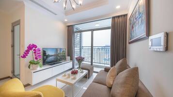 Panoramic Apartment, 2 Bedrooms, Balcony, City View | Living area | 60-inch Smart TV with digital channels
