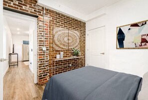 1 bedroom, desk, iron/ironing board, travel cot