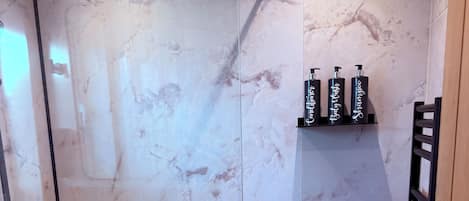 Hair dryer, towels, soap, shampoo