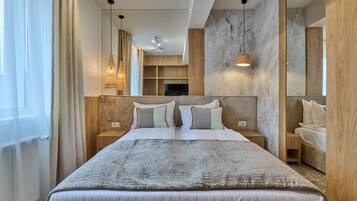 Apartemen Deluks | 2 kamar tidur, brankas, meja kerja, dan ruang kerja ramah laptop