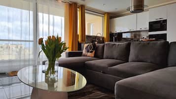 Luxury Apartment | Living area | Flat-screen TV