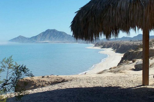 The path to the beach starts near the entrance of Casita Cortez, winding past a few neighboring homes before opening up to the sand and Sea of Cortez. It's a short, scenic walk that takes you directly from the property to the water without needing to drive.