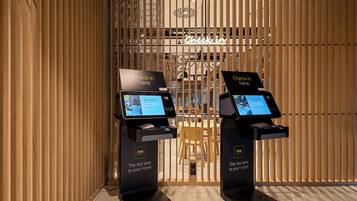 Check-in/check-out kiosk