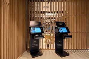 Check-in/check-out kiosk