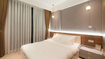 Egyptian cotton sheets, premium bedding, down duvets, pillow-top beds