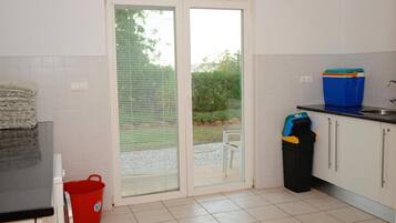 Villa | Private kitchen | Fridge, microwave, oven, stovetop