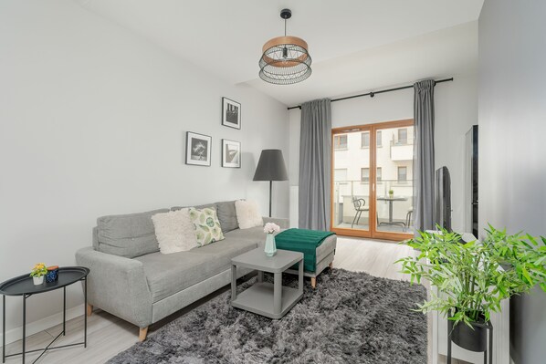 Apartamento, 1 quarto, sacada | Sala de estar