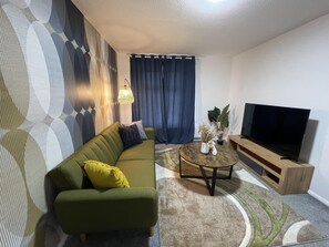 Maison | Aire de séjour | Téléviseur