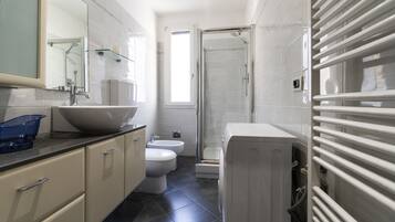 Apartment (1 Bedroom) | Bathroom | Shower, bidet, towels