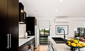Coffee/tea maker, fridge, microwave, oven