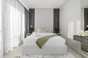 2 chambres, coffres-forts dans les chambres, fer et planche à repasser