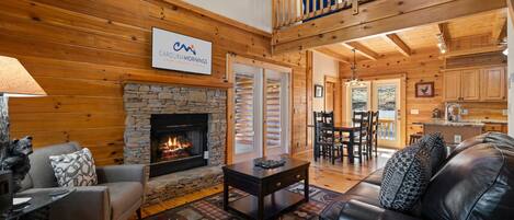 Smart TV, fireplace, table football, books