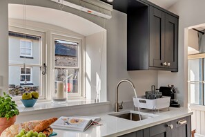 Fridge, microwave, oven, cookware/dishes/utensils