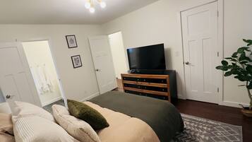 3 chambres, coffres-forts dans les chambres, fer et planche à repasser