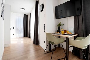 Superior Studio, Terrace | Living area | 43-inch flat-screen TV with satellite channels