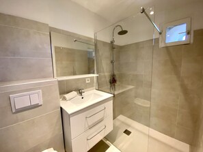 Shower, hair dryer, soap, shampoo