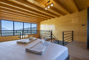 Deluxe Bungalow, 1 King Bed, Hot Tub, Mountain View | 1 bedroom, laptop workspace, free WiFi