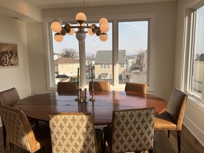 Enjoy meals in this dining area with a round table and six comfortable chairs.