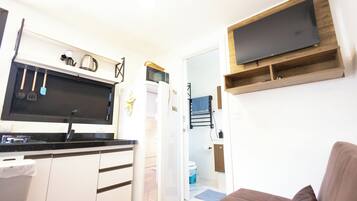 Full-sized fridge, microwave, stovetop, electric kettle