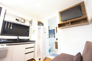 Full-size fridge, microwave, stovetop, electric kettle